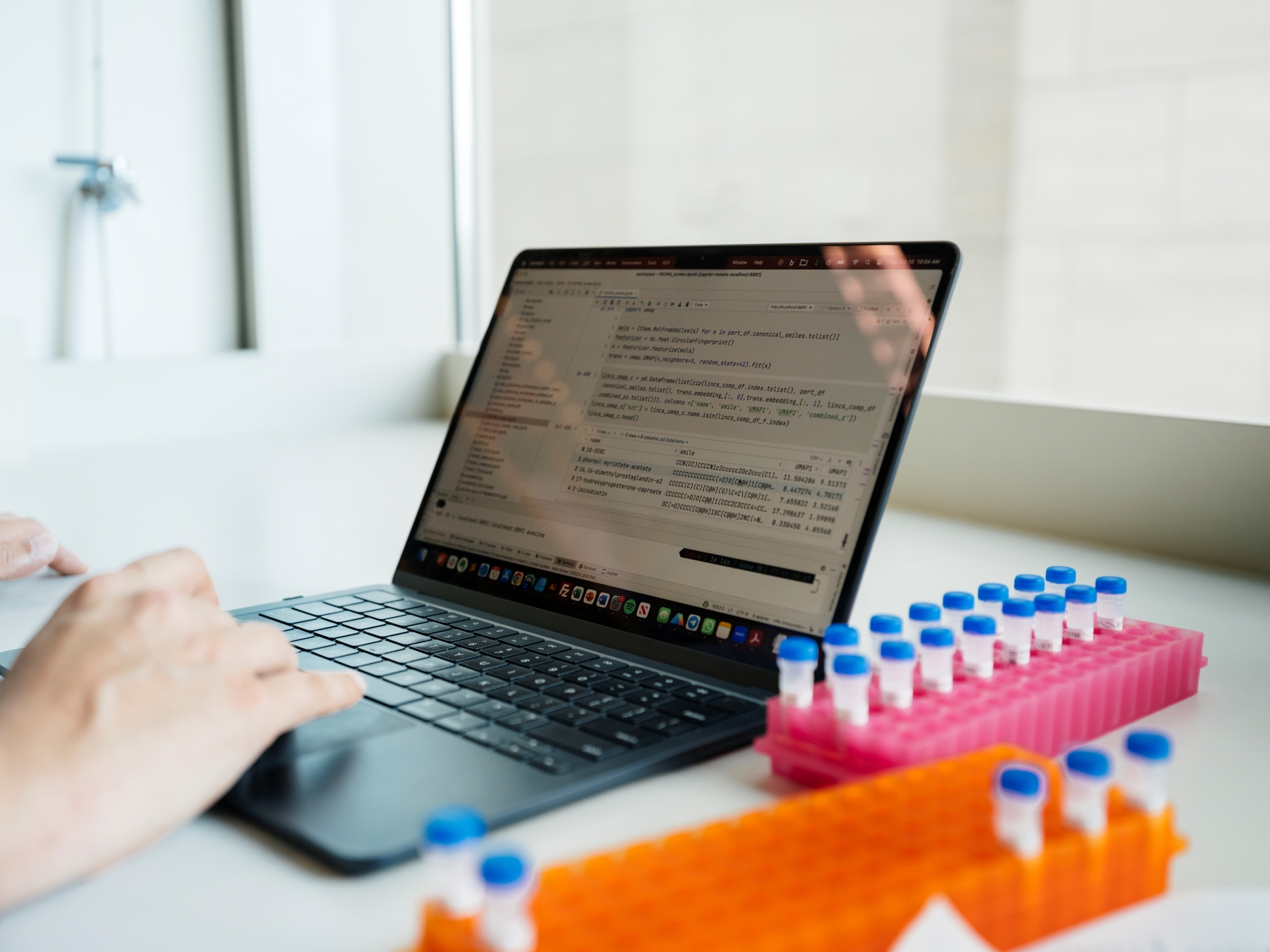 Laptop and test tubes